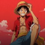 Luffy from One Piece smiling, wearing a straw hat, red open shirt and blue shorts, against a red sky with clouds.